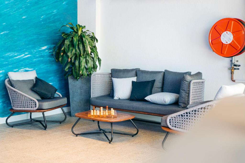 Posezení v ubytování Capsuleaccom Hostel