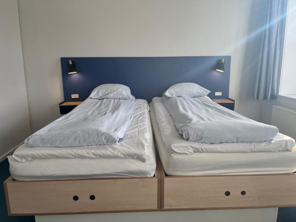 Postel nebo postele na pokoji v ubytování BB-Hotel Aarhus Havnehotellet