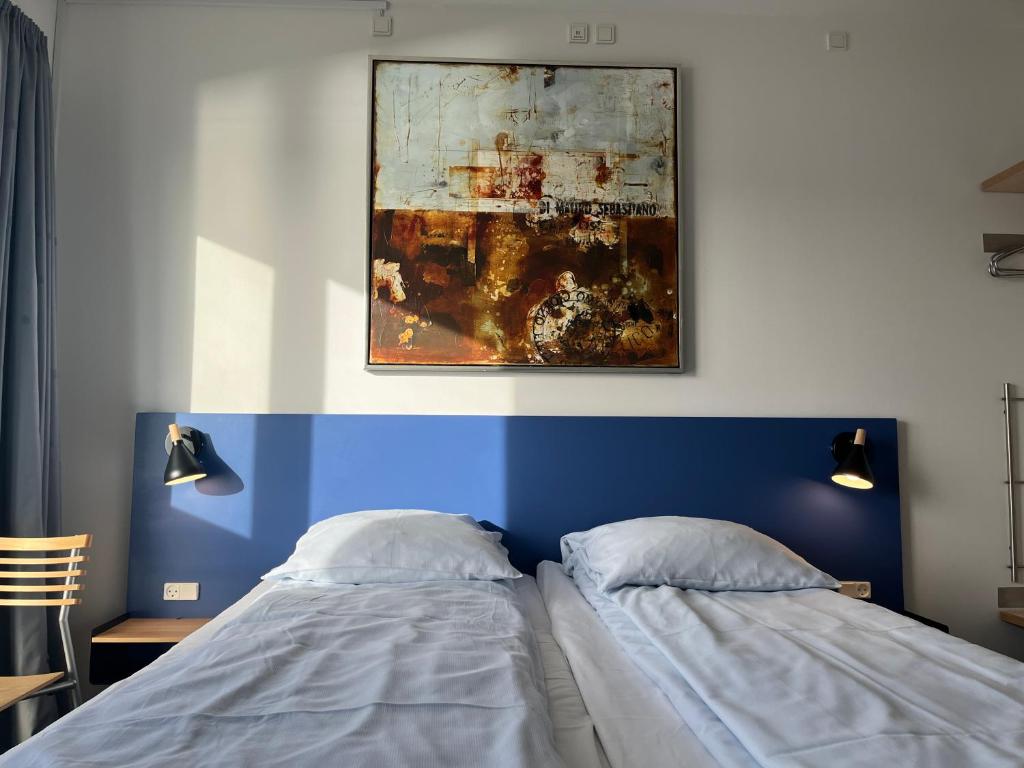Postel nebo postele na pokoji v ubytování BB-Hotel Aarhus Havnehotellet