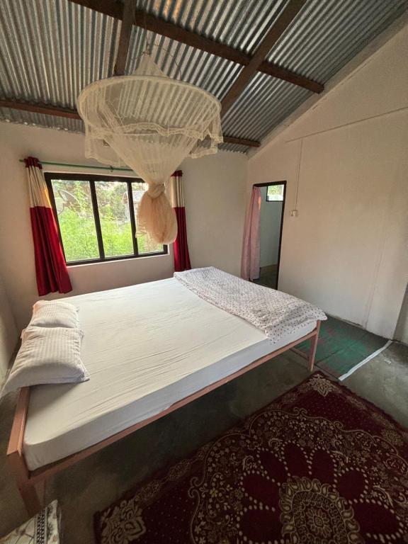 Postel nebo postele na pokoji v ubytování Nanu's Bardiya Homestay