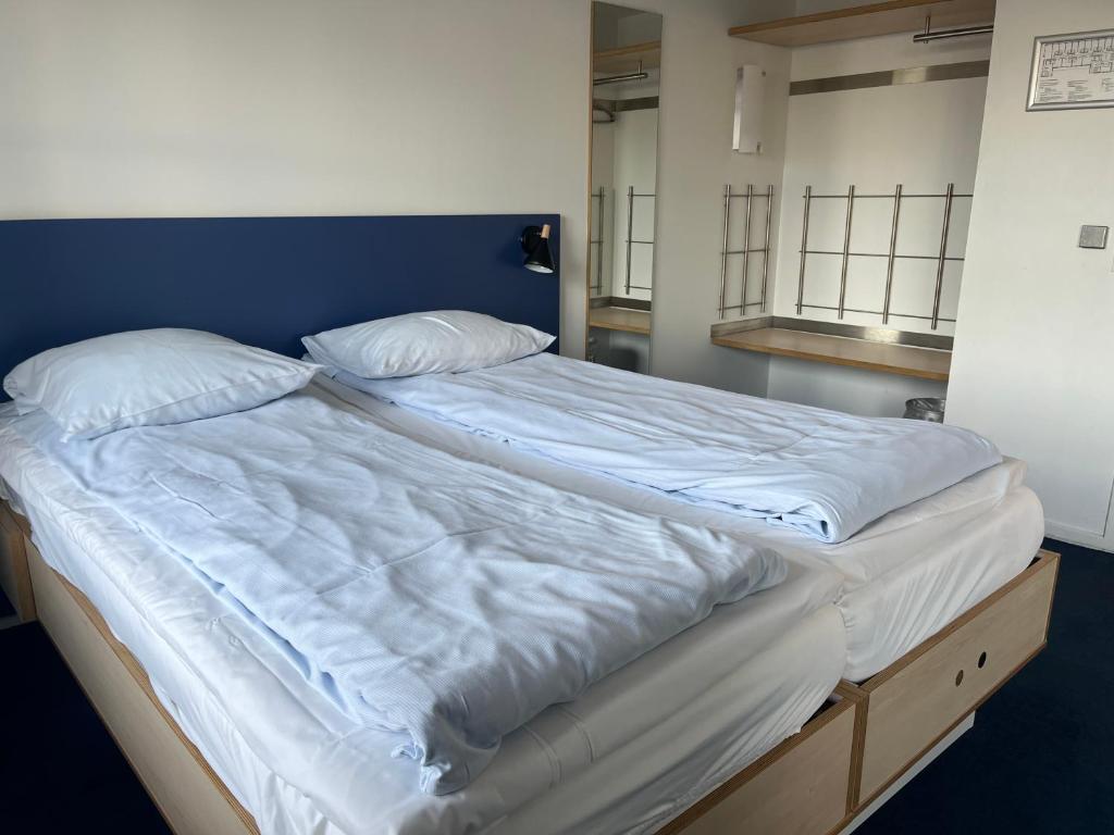 Postel nebo postele na pokoji v ubytování BB-Hotel Aarhus Havnehotellet