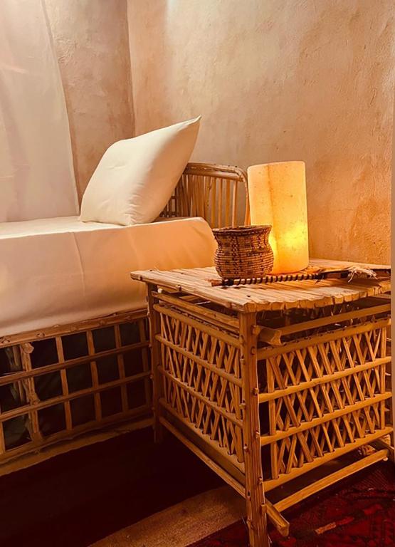 Postel nebo postele na pokoji v ubytování Tanirt ecolodge