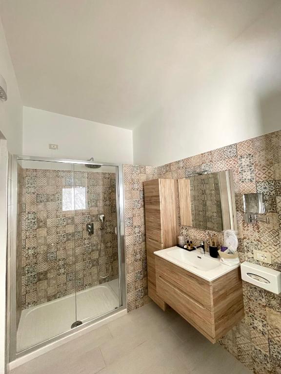 a bathroom with a shower and a sink at B&B SoleLuna in Lampedusa