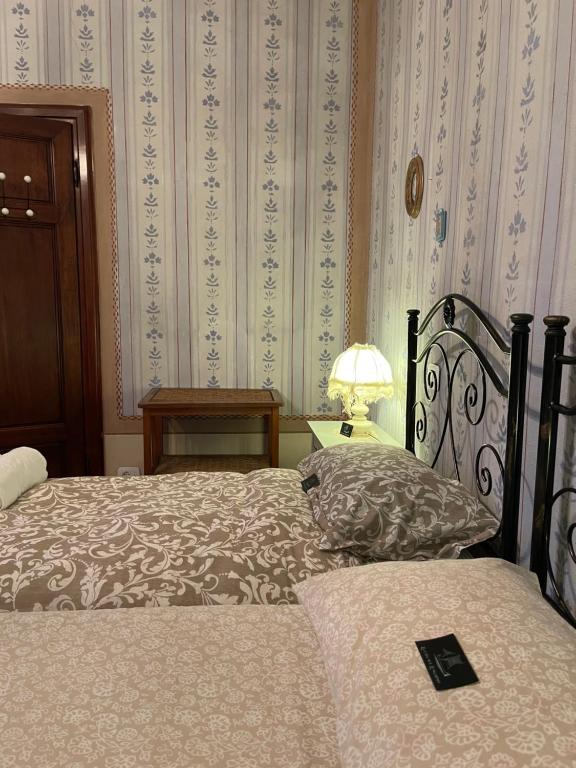 A bed or beds in a room at La Casa sul Lungarno