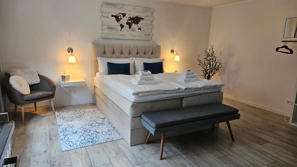Ένα ή περισσότερα κρεβάτια σε δωμάτιο στο Enny Suite Apartment im schönen Rheinland