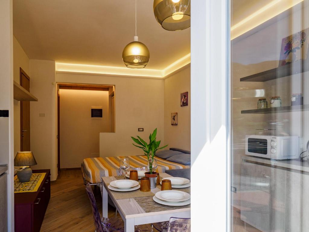 Kuchyň nebo kuchyňský kout v ubytování Macaia Apartment with AC