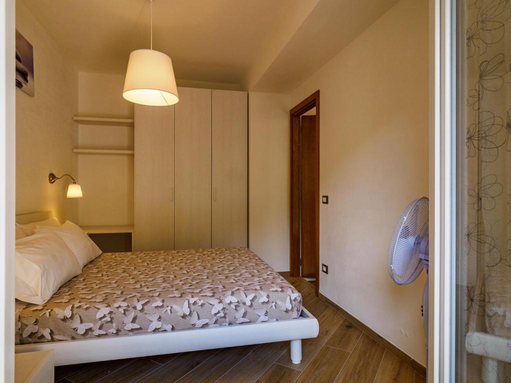 Postel nebo postele na pokoji v ubytování Macaia Apartment with AC