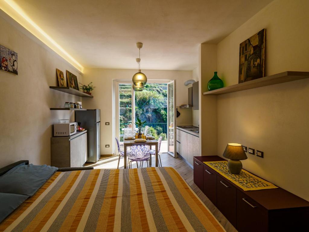 Kuchyň nebo kuchyňský kout v ubytování Macaia Apartment with AC