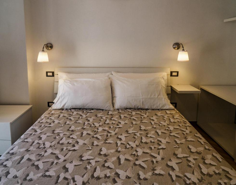Postel nebo postele na pokoji v ubytování Macaia Apartment with AC