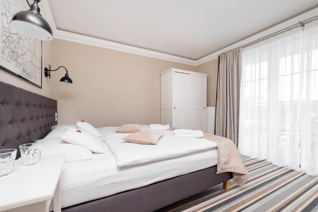Postel nebo postele na pokoji v ubytování Villa Astra Baltica