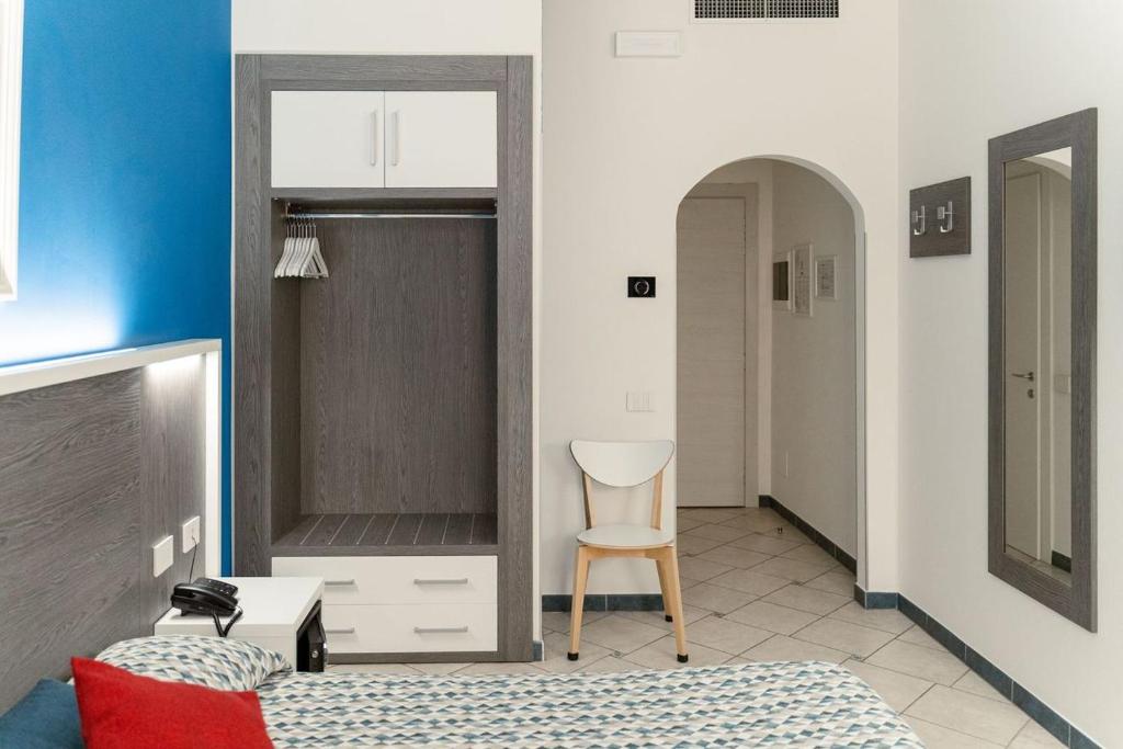 Postel nebo postele na pokoji v ubytování Maritan Hotel & Spa
