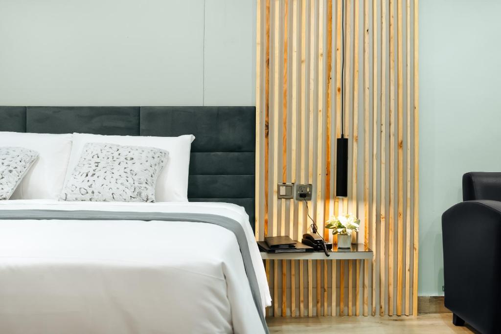 Postel nebo postele na pokoji v ubytování Kashco Apartments Wuse 2 Abuja