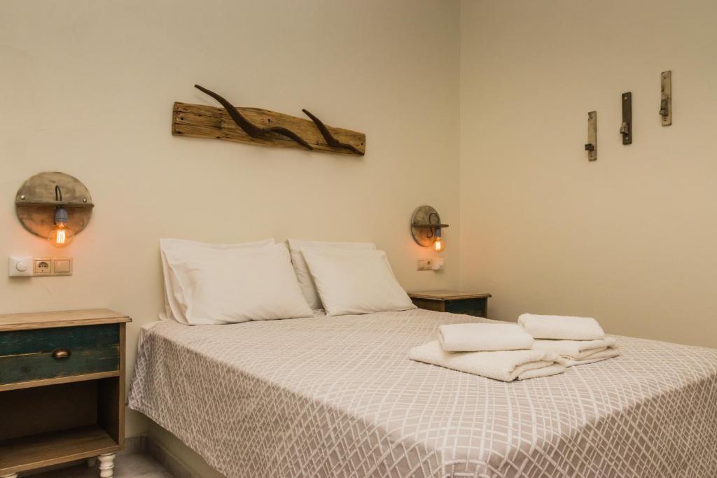 Postel nebo postele na pokoji v ubytování Hotel Sunshine Matala