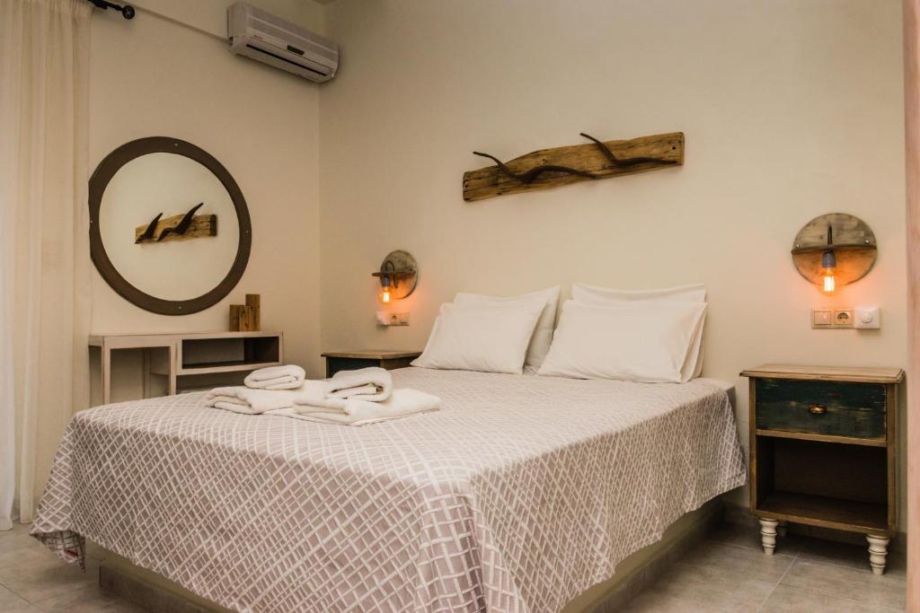Postel nebo postele na pokoji v ubytování Hotel Sunshine Matala