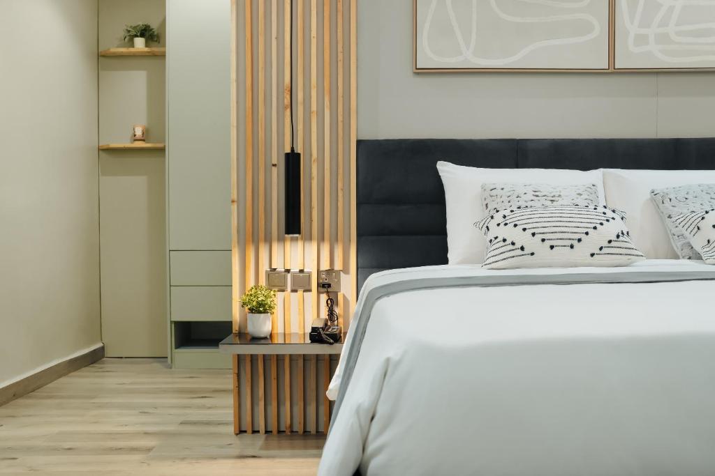 Postel nebo postele na pokoji v ubytování Kashco Apartments Wuse 2 Abuja