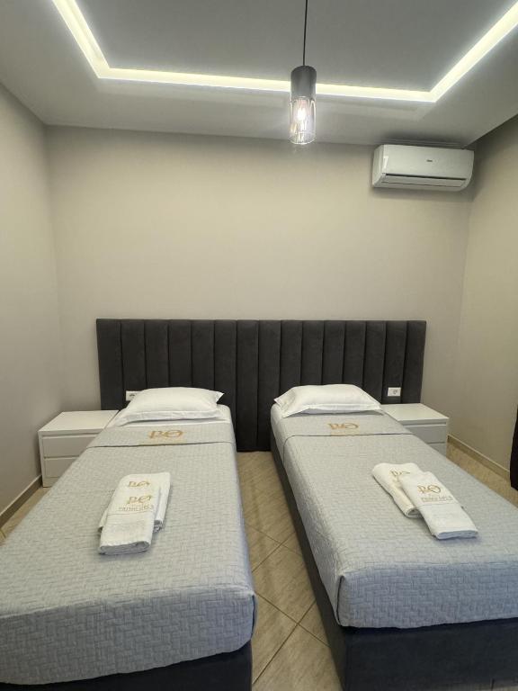 Postel nebo postele na pokoji v ubytování Villa Primo Opus