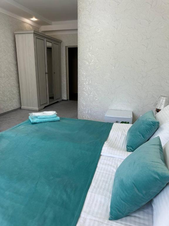Postel nebo postele na pokoji v ubytování Готель-спа "Еліт"