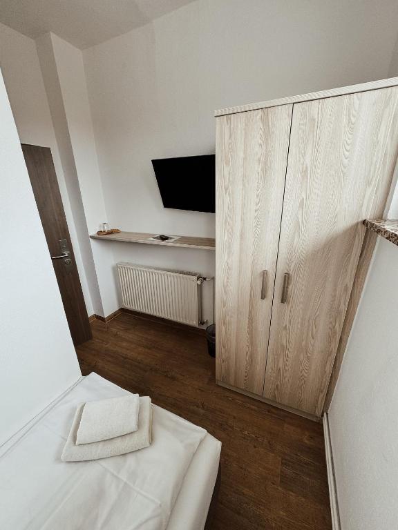 TV a/nebo společenská místnost v ubytování Hotel am Stadtpark Nordhausen