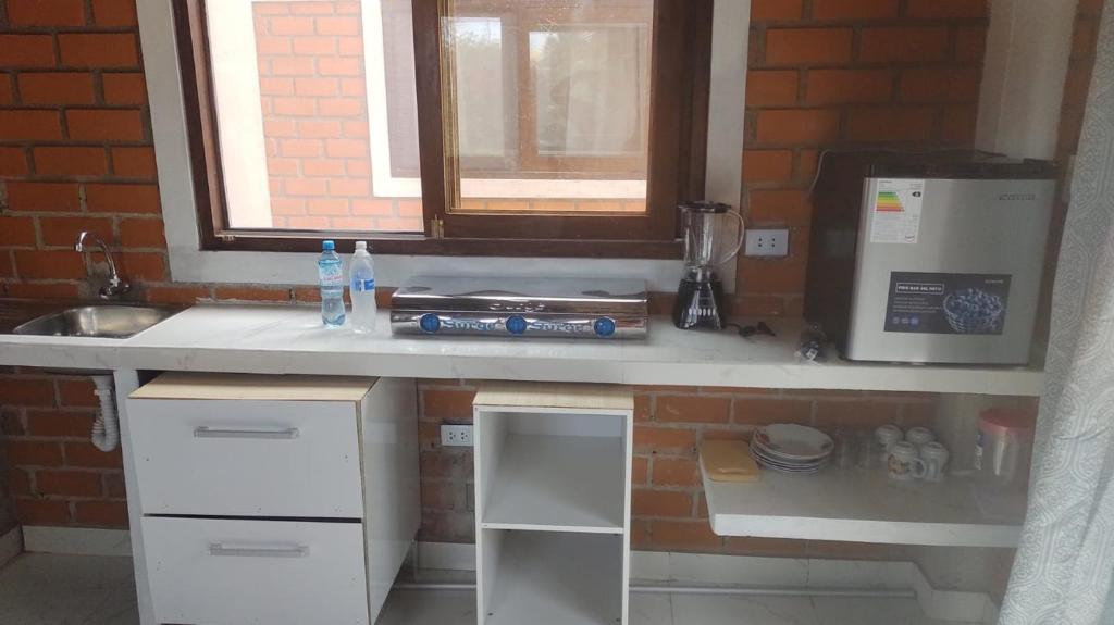 Kuchyň nebo kuchyňský kout v ubytování Punta Pacífico Bungalows Máncora