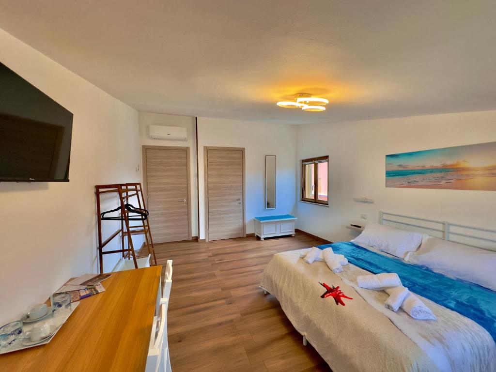 Postel nebo postele na pokoji v ubytování Casa del Mare