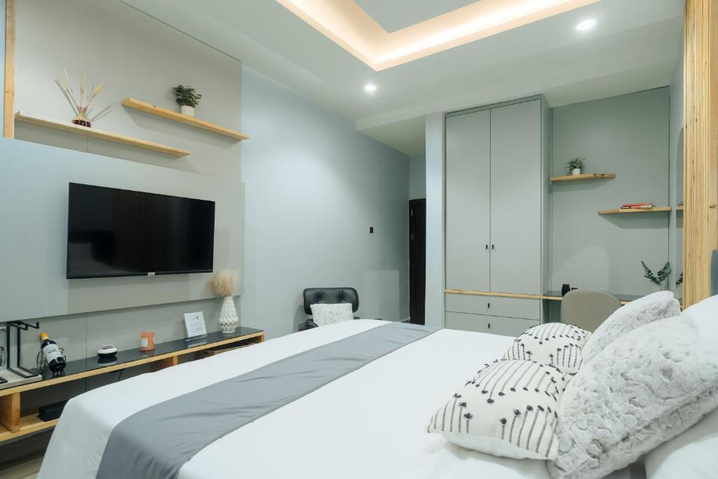 Postel nebo postele na pokoji v ubytování Kashco Apartments Wuse 2 Abuja