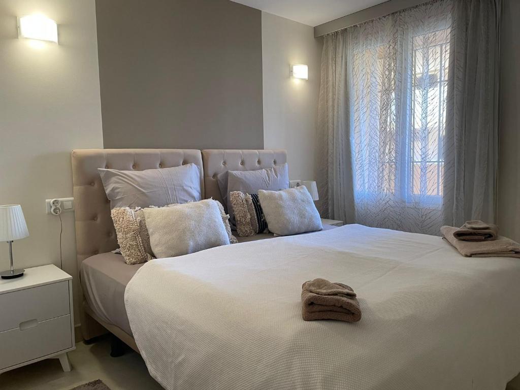 Postel nebo postele na pokoji v ubytování Santa Maria Village, Elviria, Marbella