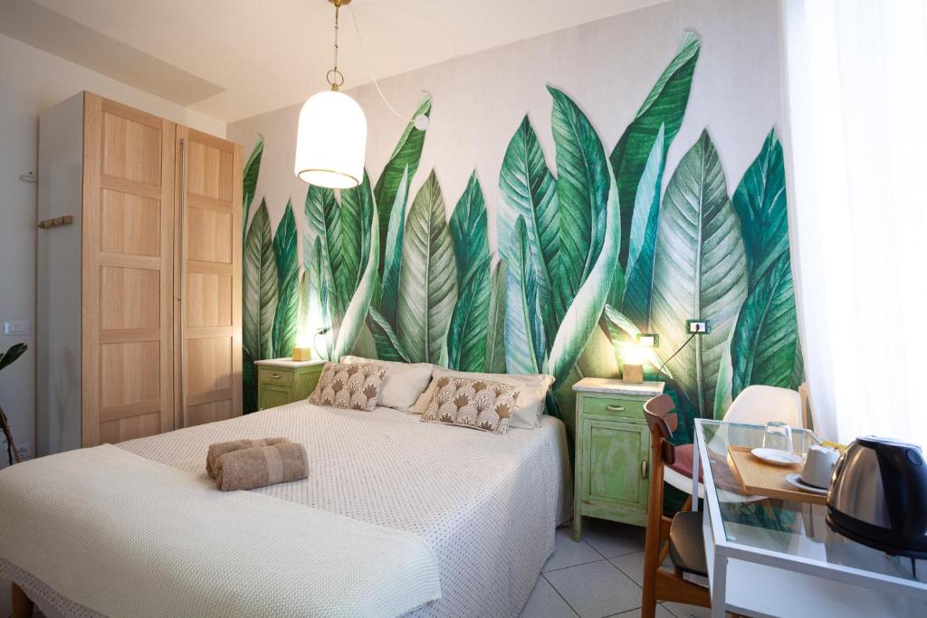 Postel nebo postele na pokoji v ubytování B&B La Volpina