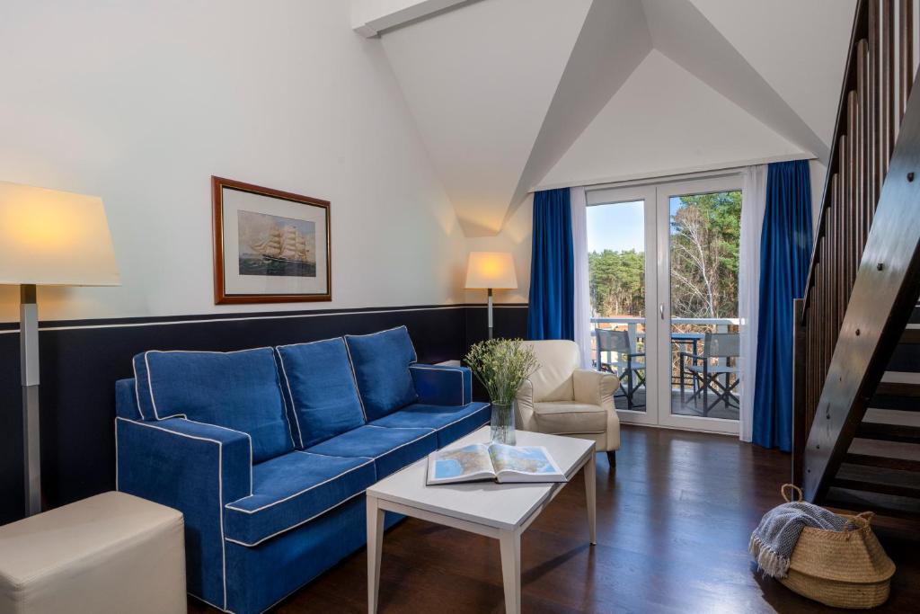 Ein Sitzbereich in der Unterkunft Precise Resort Hafendorf Rheinsberg