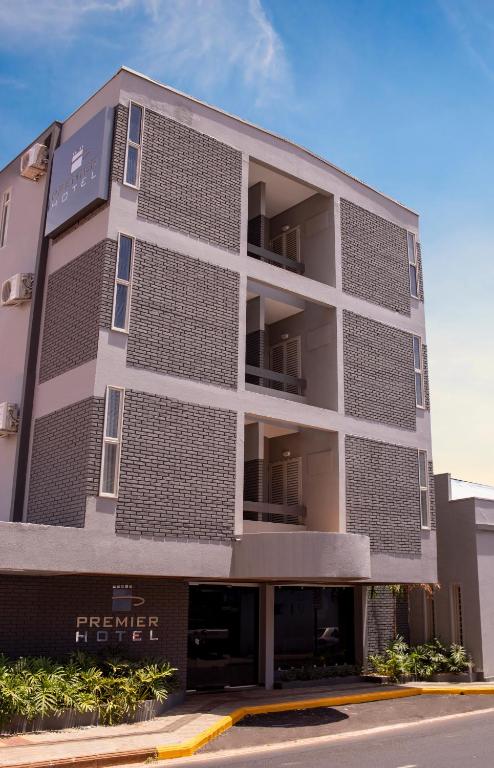 a rendering of the front of a building at Premier Hotel in Votuporanga