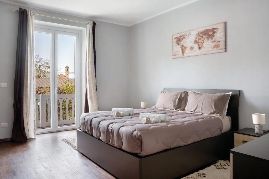 Ένα ή περισσότερα κρεβάτια σε δωμάτιο στο Casa vacanze Nada
