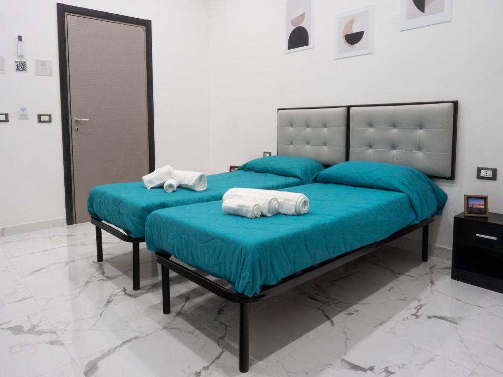 Letto o letti in una camera di Laura Suite