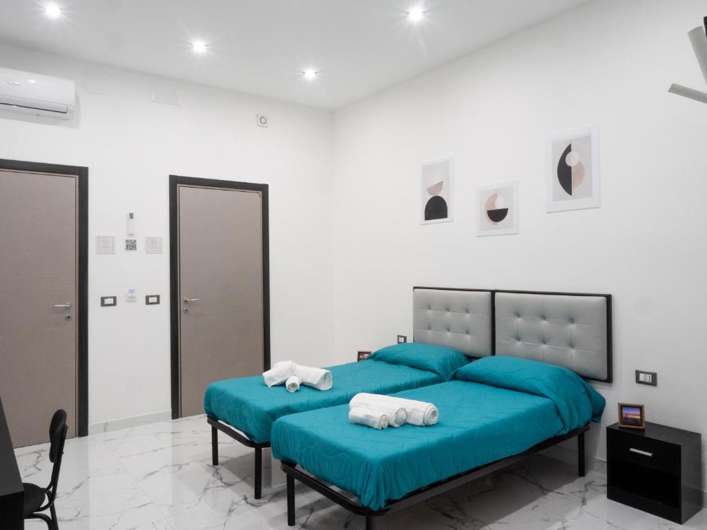 Letto o letti in una camera di Laura Suite