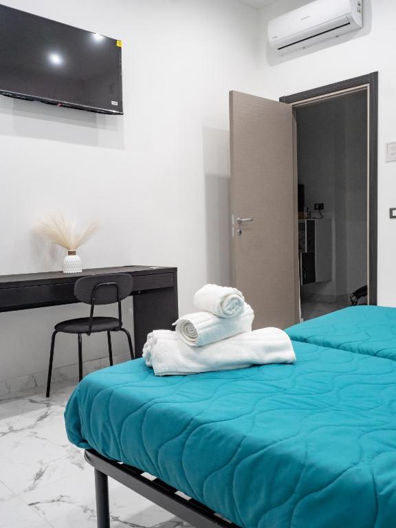 Letto o letti in una camera di Laura Suite