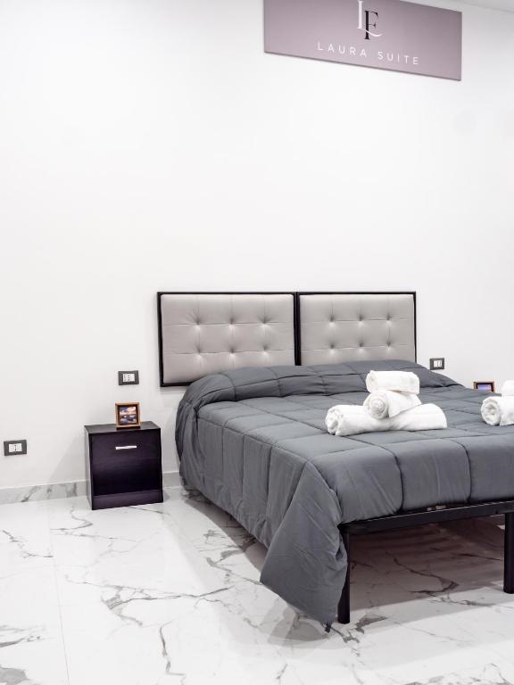 Letto o letti in una camera di Laura Suite