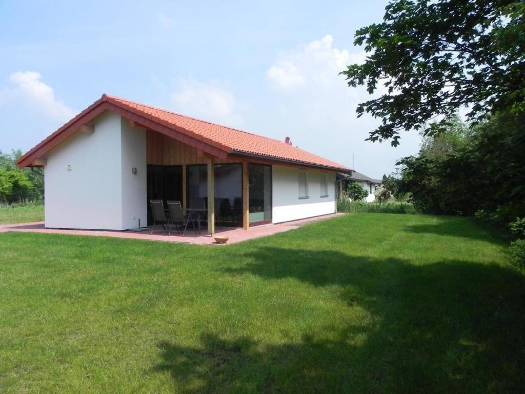 E18 Ferienhaus mit Garten und Terrasse, Butjadingen (updated prices 2025)