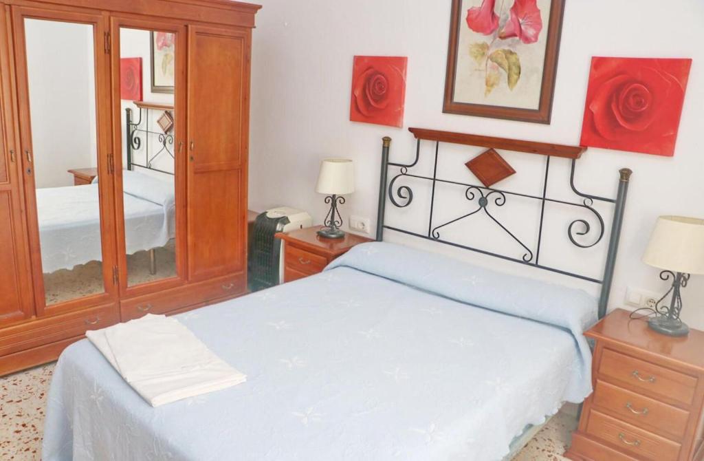 Posteľ alebo postele v izbe v ubytovaní Apartamento Trafalgar