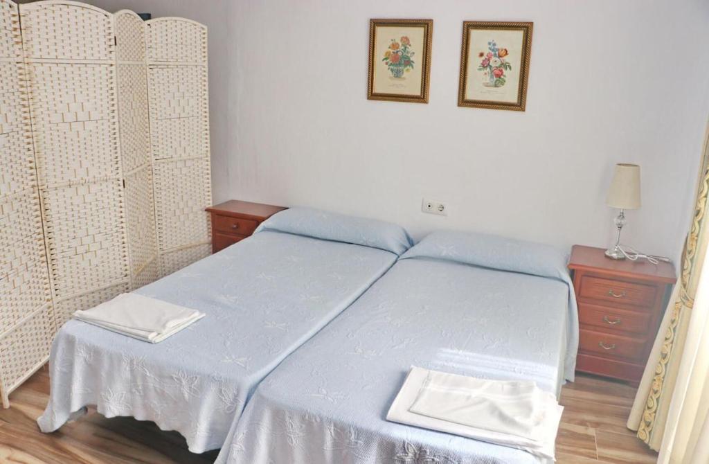 Posteľ alebo postele v izbe v ubytovaní Apartamento Trafalgar