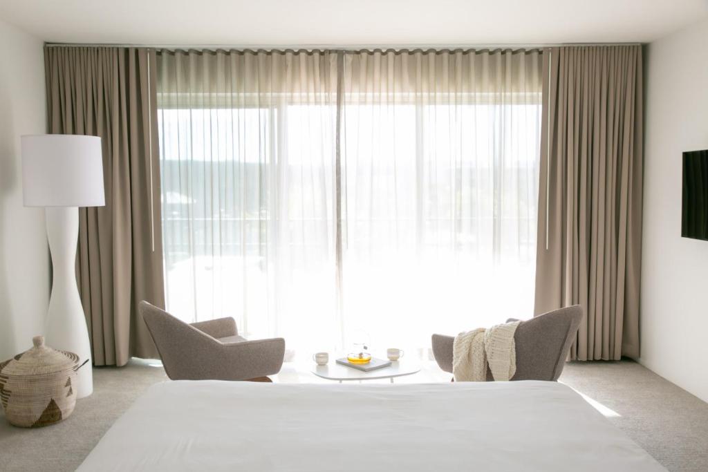 Postel nebo postele na pokoji v ubytování CIVANA Wellness Resort & Spa