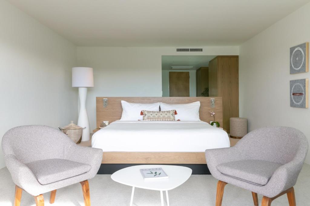 Postel nebo postele na pokoji v ubytování CIVANA Wellness Resort & Spa