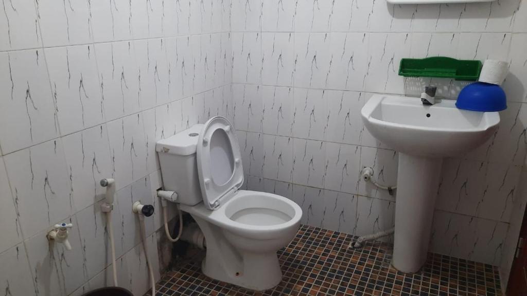 Koupelna v ubytování KANTHI GUEST INN