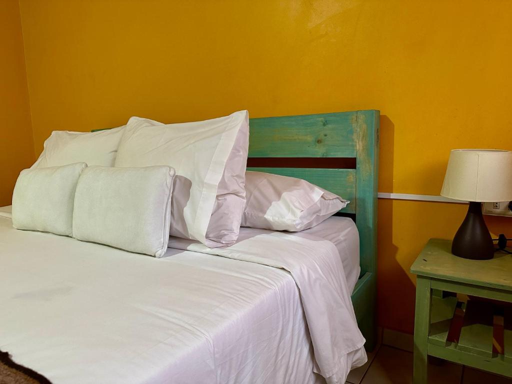 Postel nebo postele na pokoji v ubytování Hostal Qachi Chentura