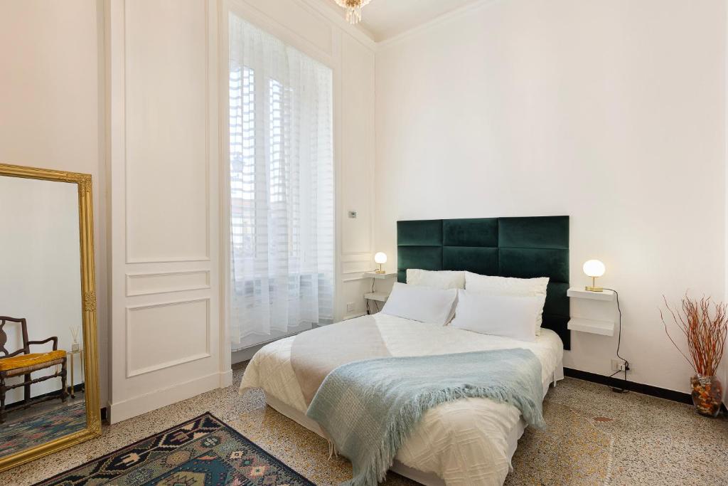 מיטה או מיטות בחדר ב-Casa Magnolia appartamento in Stazzano