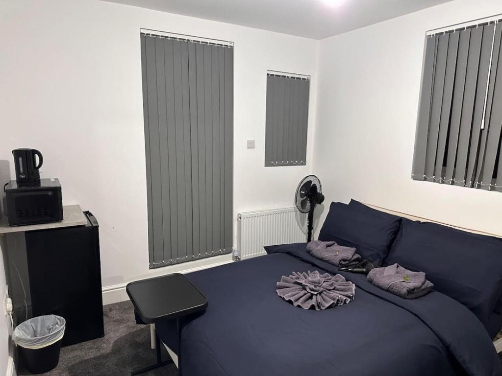 Postel nebo postele na pokoji v ubytování Oxford street minutes away