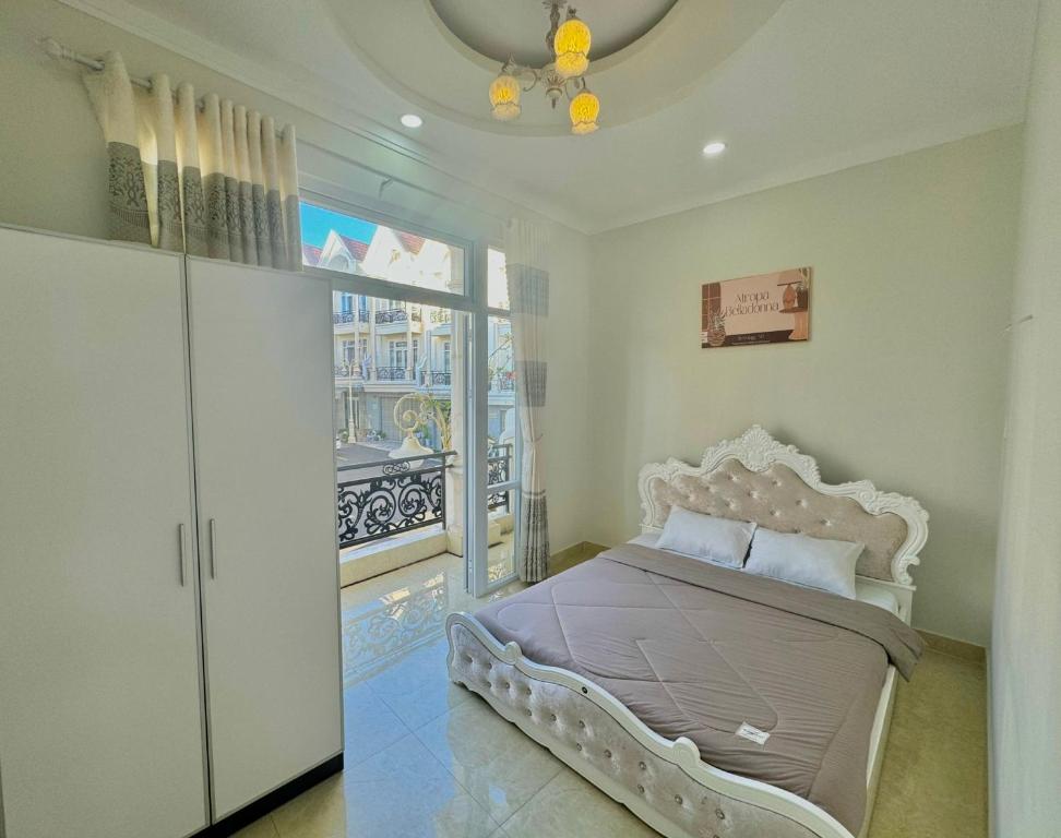 Postel nebo postele na pokoji v ubytování Villa Đà Lạt GD - Biệt Thự Đà Lạt GD Gần Hồ Xuân Hương Gần Chợ