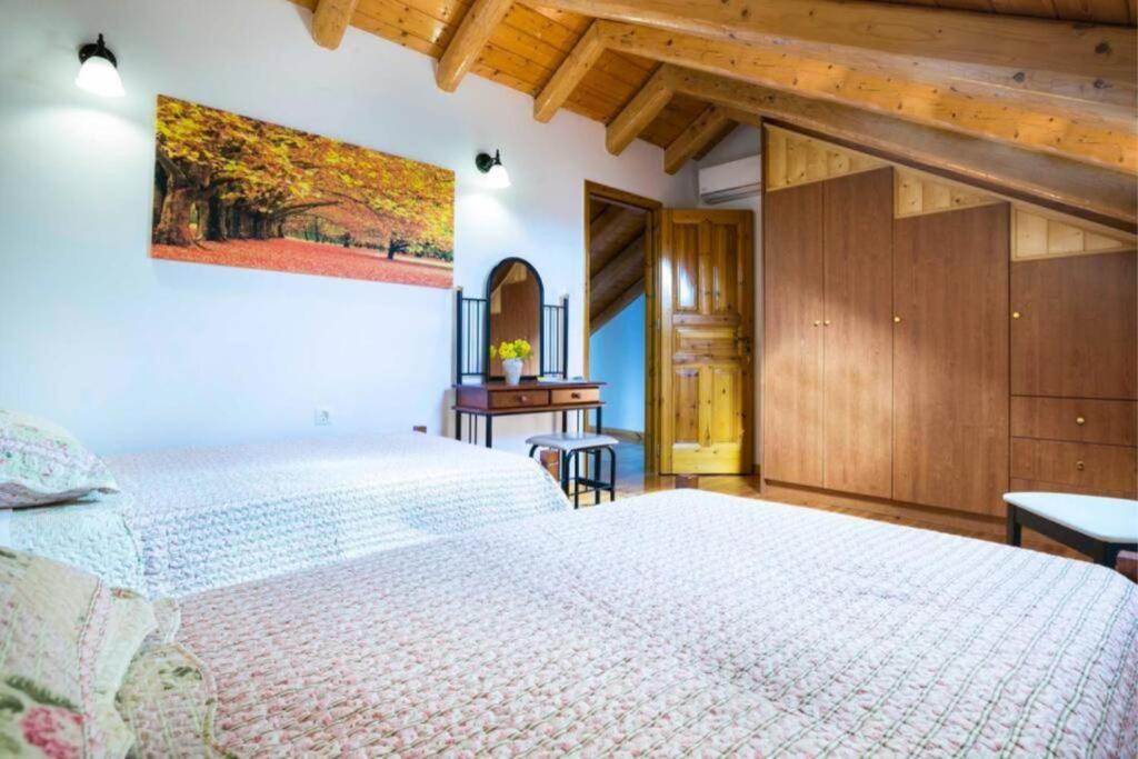 Postel nebo postele na pokoji v ubytování 1841 Petrino Villa