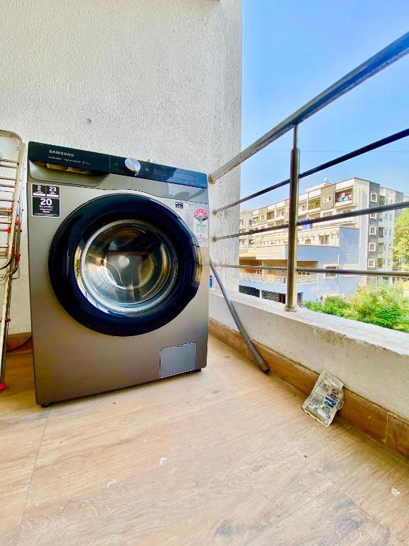 Balkón nebo terasa v ubytování 2 BHK AC Apartment