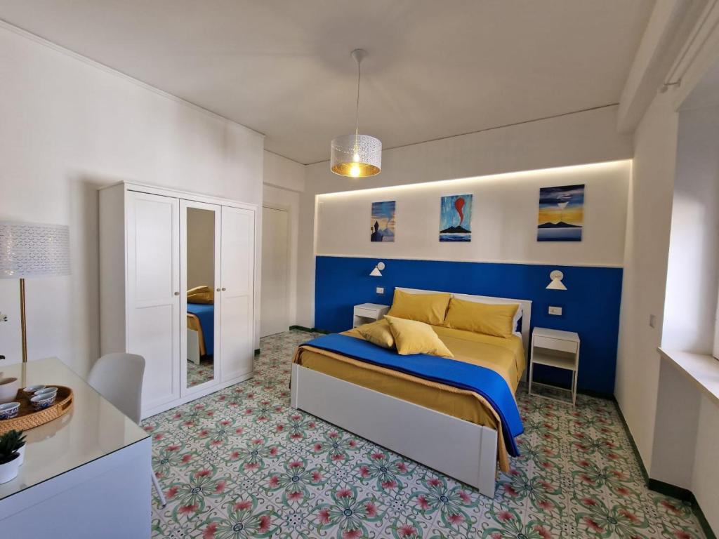 Postel nebo postele na pokoji v ubytování Bellevue Sorrento