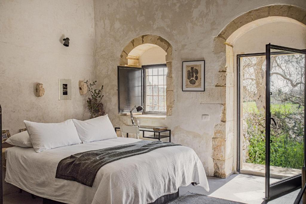 Postel nebo postele na pokoji v ubytování Casa Balat
