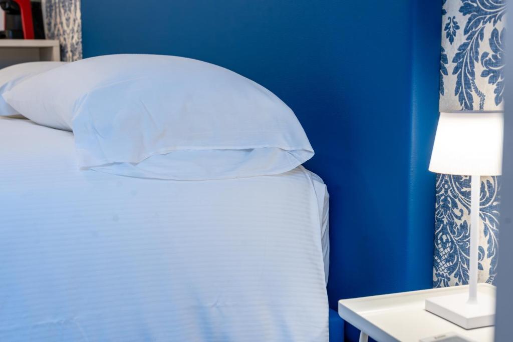 Postel nebo postele na pokoji v ubytování B&B Via Corsica 10