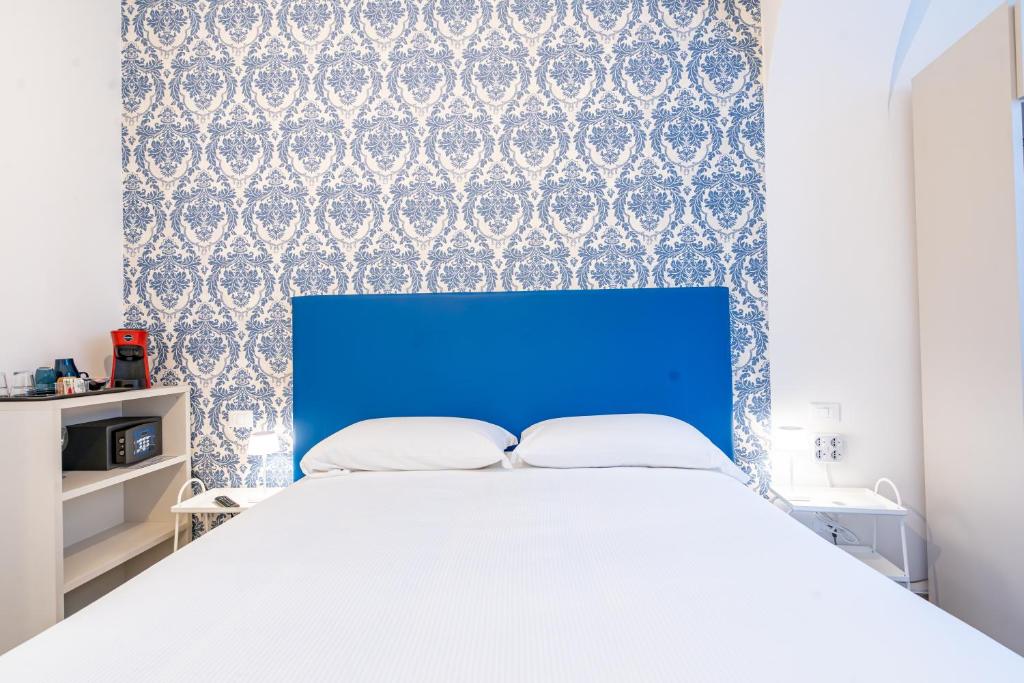 Postel nebo postele na pokoji v ubytování B&B Via Corsica 10